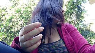 i'm nicoletta smoking in a public garden flashing my big tits outdoors