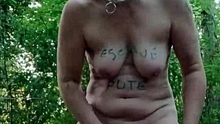 amateur milf slave bound with buttplug gets slapped and humiliated in outdoor forest bdsm session