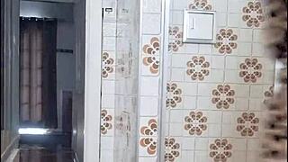 latina milf prepares in bathroom for exhibitionist fun