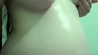 pregnant wife gets cream and massage