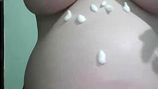 pregnant wife gets cream and massage