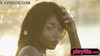 petite ebony milf strips down in the pool, showing off her juicy tits