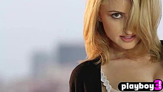 Amazing blonde model does a sensual striptease after posing for photos