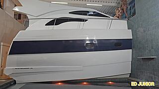 Blonde Latina Rides on Yacht in Sheer Outfit