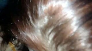 This brunette girlfriend sucks big cock in homemade interracial scene.