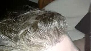 Bound slave in sauna gloryhole receives handjob and blowjob