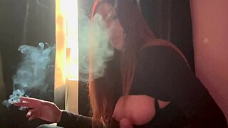Artemisia Love dives into steamy solo dildo action. She smokes a cigarette during the fetish play.