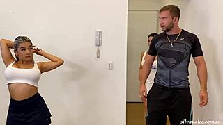 Yoga teacher guides his curvy Latina students