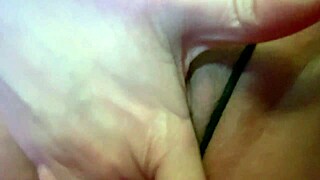 Hot goth girl masturbates her wet pussy! close up action with lipstick and tits