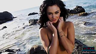 Petite Canadian milf shows off her big ass in a solo striptease on the beach