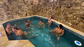hey check out this fun orgy with friends splashing around in the motel pool