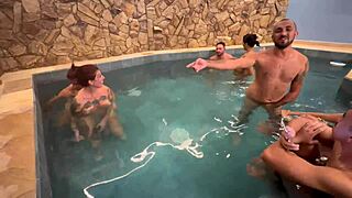 hey check out this fun orgy with friends splashing around in the motel pool