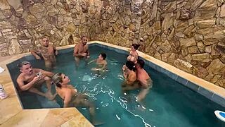 hey check out this fun orgy with friends splashing around in the motel pool