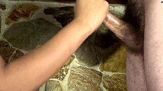 Hot curly Colombian girl gives athletic handjob in oiled close-up, ending with big cumshot on her eyes and face by mistake