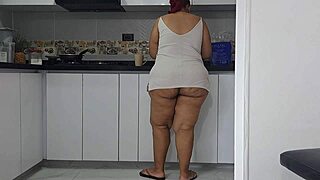 i watch my stepmother's large backside in the kitchen