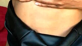 ebony milf playing with a vibrator then pees on her self!