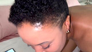 Ebony slut masturbates and gives head with ass licking kissing balls and hand job on big black cock for massive load