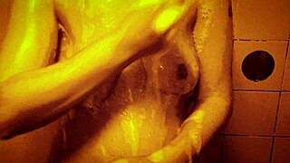 Wow, check out this sexy slow mo shower with horny milf massaging her wet tits and nipples!