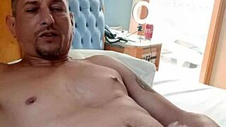 Hey, check out this awesome cumshot session with mature tattooed guy