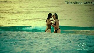 Olive Gee and her blonde girlfriend share intimate moments on the bed with kissing and muff diving.