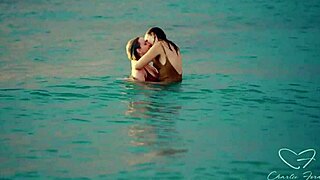 Olive Gee and her blonde girlfriend share intimate moments on the bed with kissing and muff diving.