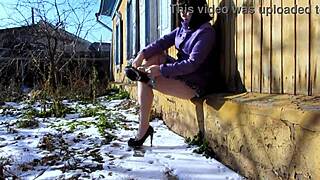 Brunette milf stands behind garages to piss in open air with her dirty shaved pussy exposed for public fetish thrill.