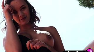 hey, you think this petite blonde teen model can handle hot outdoor striptease posing?