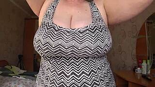 big gorgeous tits of chubby bbw milf swing in close-up view during her solo session