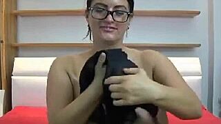 Wow, check out this milf with huge tits riding that dildo wildly on cam!