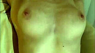 Liz Ashleys CANDID HOLIDAY STRIP Shows Off Boobs and Legs!