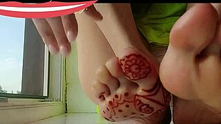 horny milf gives oily foot massage with fingers and candle showing legs in heels without skirt for feet fetish in homemade video with wet panties