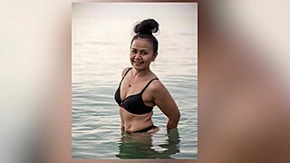 oh wow, this asian babe with big ass tempts her muscular daddy during a photoshoot in tropical nights