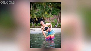 oh wow, this asian babe with big ass tempts her muscular daddy during a photoshoot in tropical nights