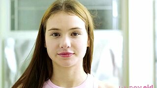 Beautiful brunette enjoys a refreshing shower