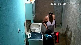 Hey, check out this hidden camera catching the Brazilian neighbor masturbating in the backyard while her father-in-law watches!