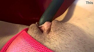 Italian milf Artemisia Love teases wet pussy with toy in slow motion.