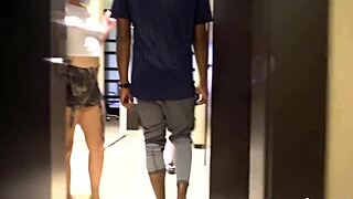 Two masked whores slobber on cocks through glory holes social distancing style