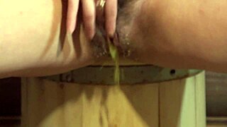Hairy milf fingers wet pussy to squirting orgasm toilet pee fetish
