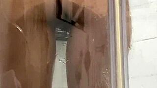 petite arab teen fingers her big pussy lips in shower