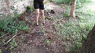 Indian stepmom fingers oiled pussy with bottle deep in jungle outdoors