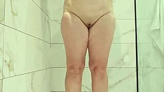 jurels spreads shaved milf pussy and fat ass in steamy shower bath