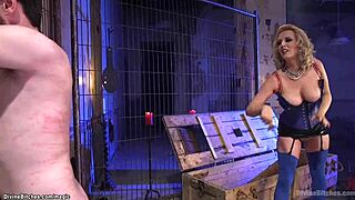 bound busty milf whips slave then pegs his ass hard in bizarre femdom dungeon