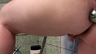 Sexy milf brunette fingers pussy squirts orgasm in shower with toys