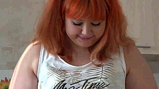 Redhead Milf Wiggles Fat Ass on Cucumber in Kitchen!